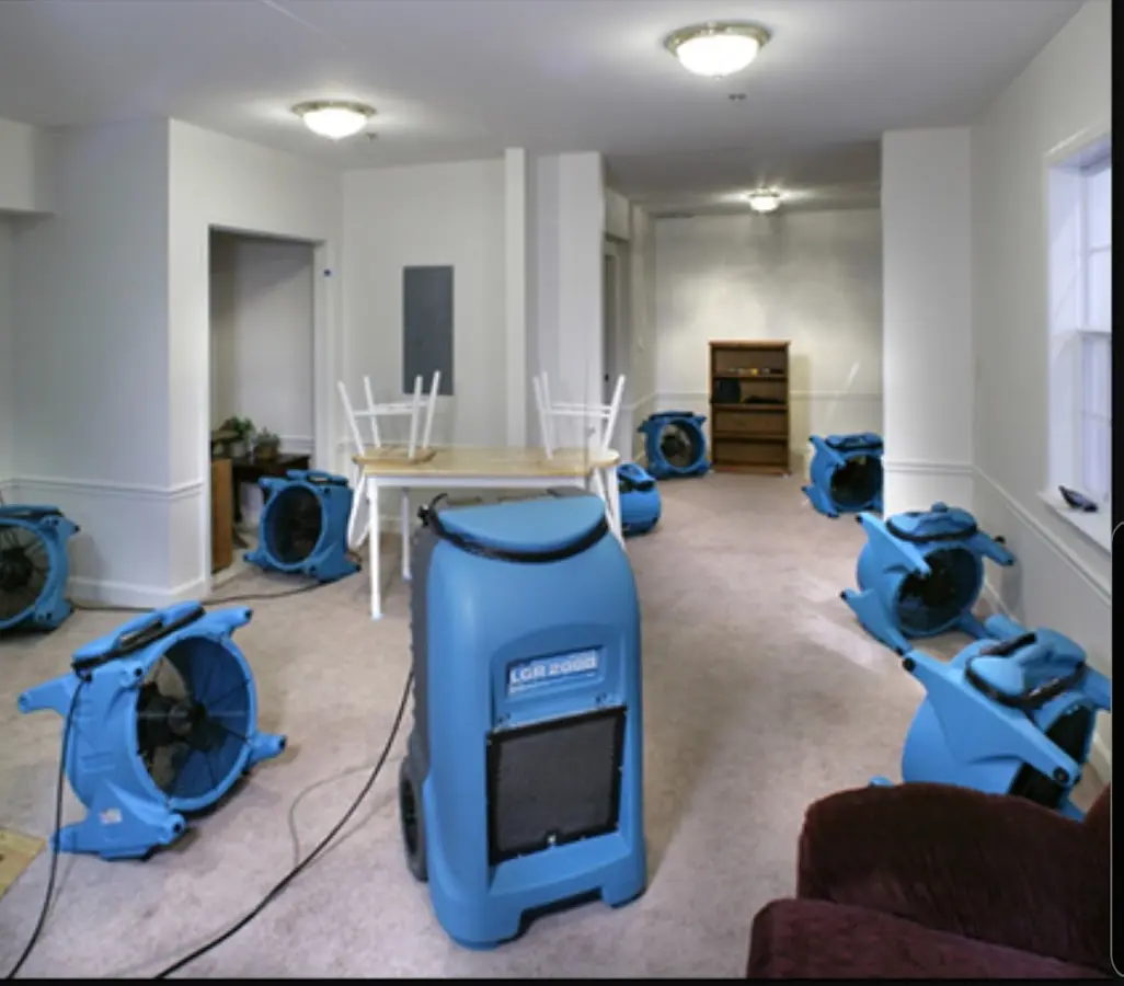Air movers and dehumidifier setup for Water Damage Restoration in Austintown